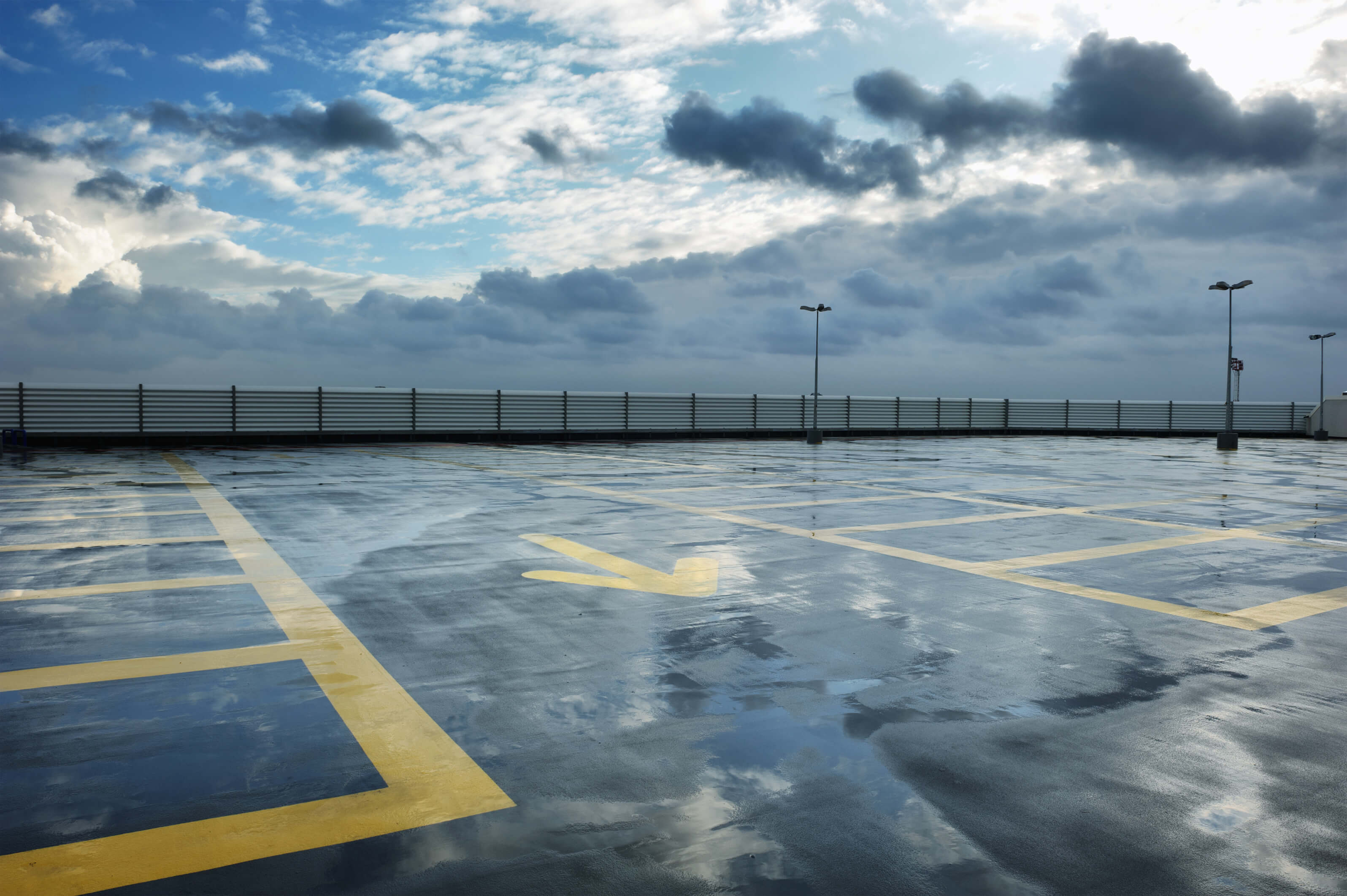 Rainy rooftop parking lot