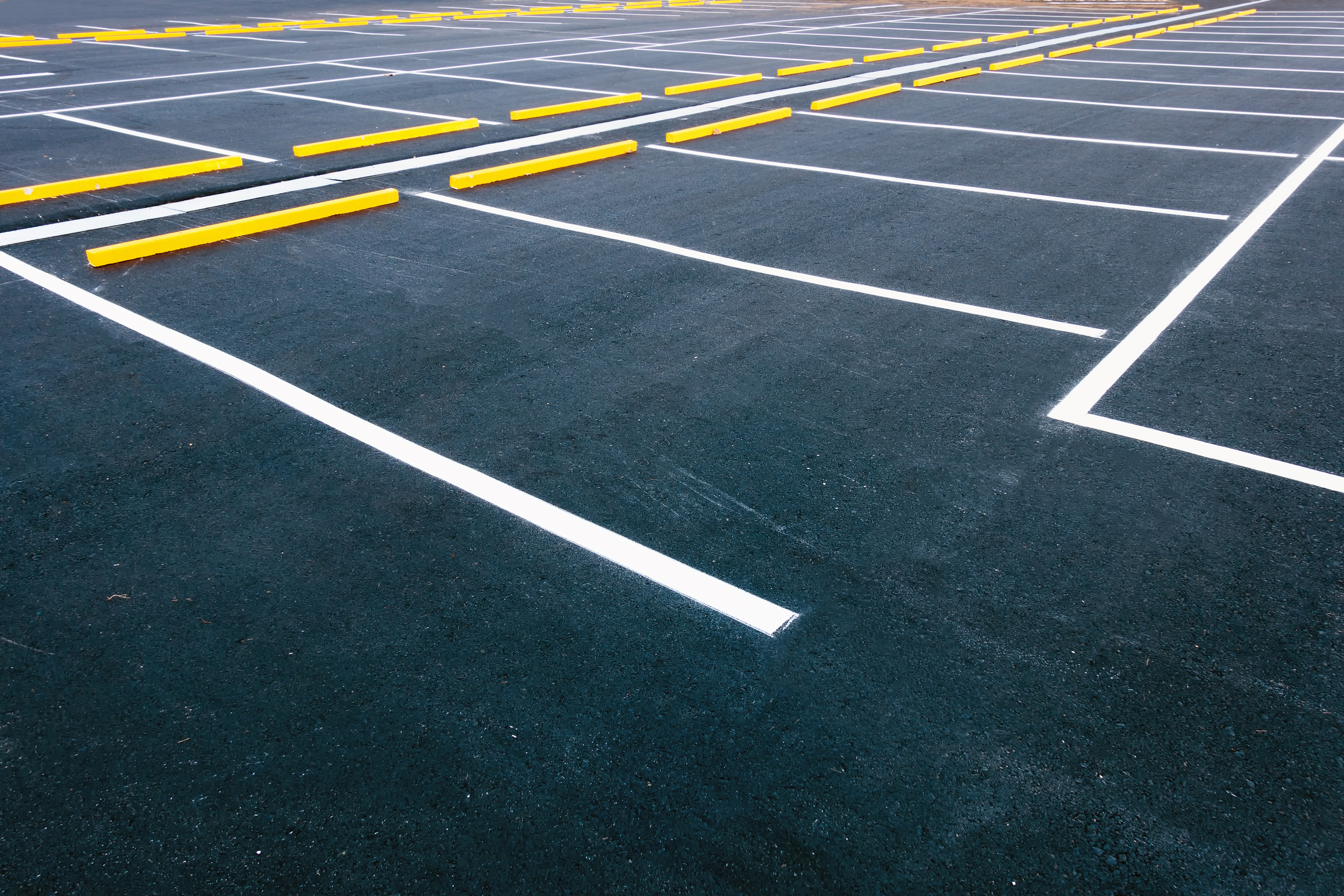 Freshly paved parking lot.